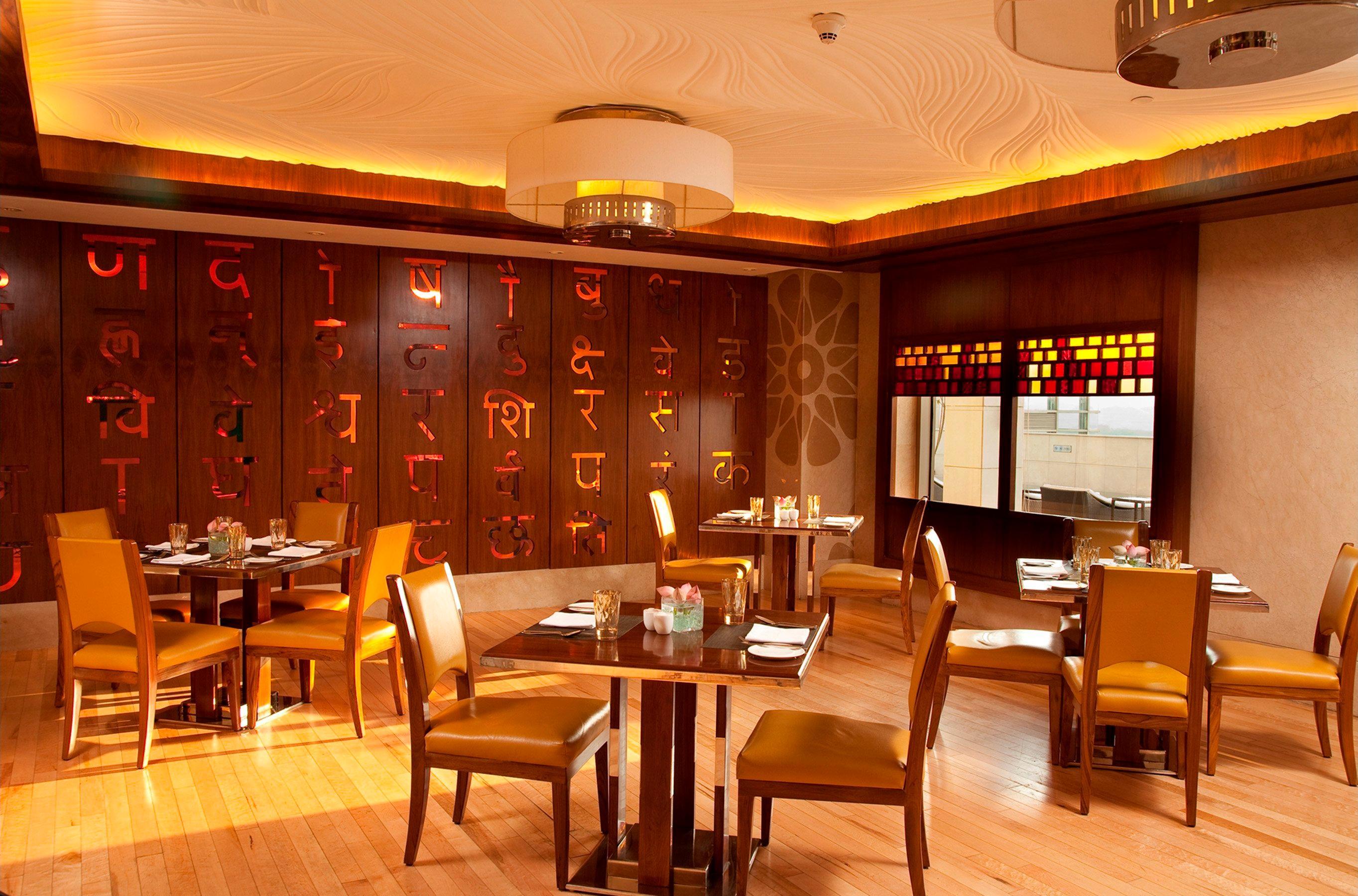 Hotel Crowne Plaza New Delhi Okhla By Ihg Restaurant photo The interior of the restaurant